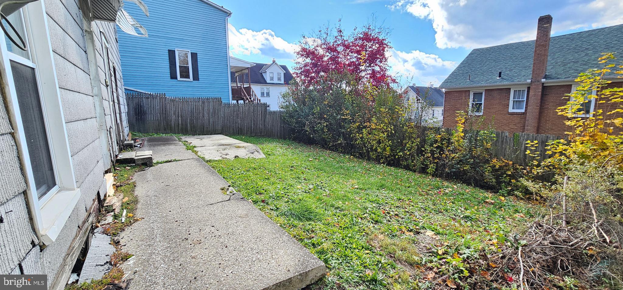 922-924 Von Lunen Road Johnstown, PA 15902 - Photo 3 of 54 a backyard of a house with lots of green space