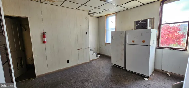 an empty room with windows