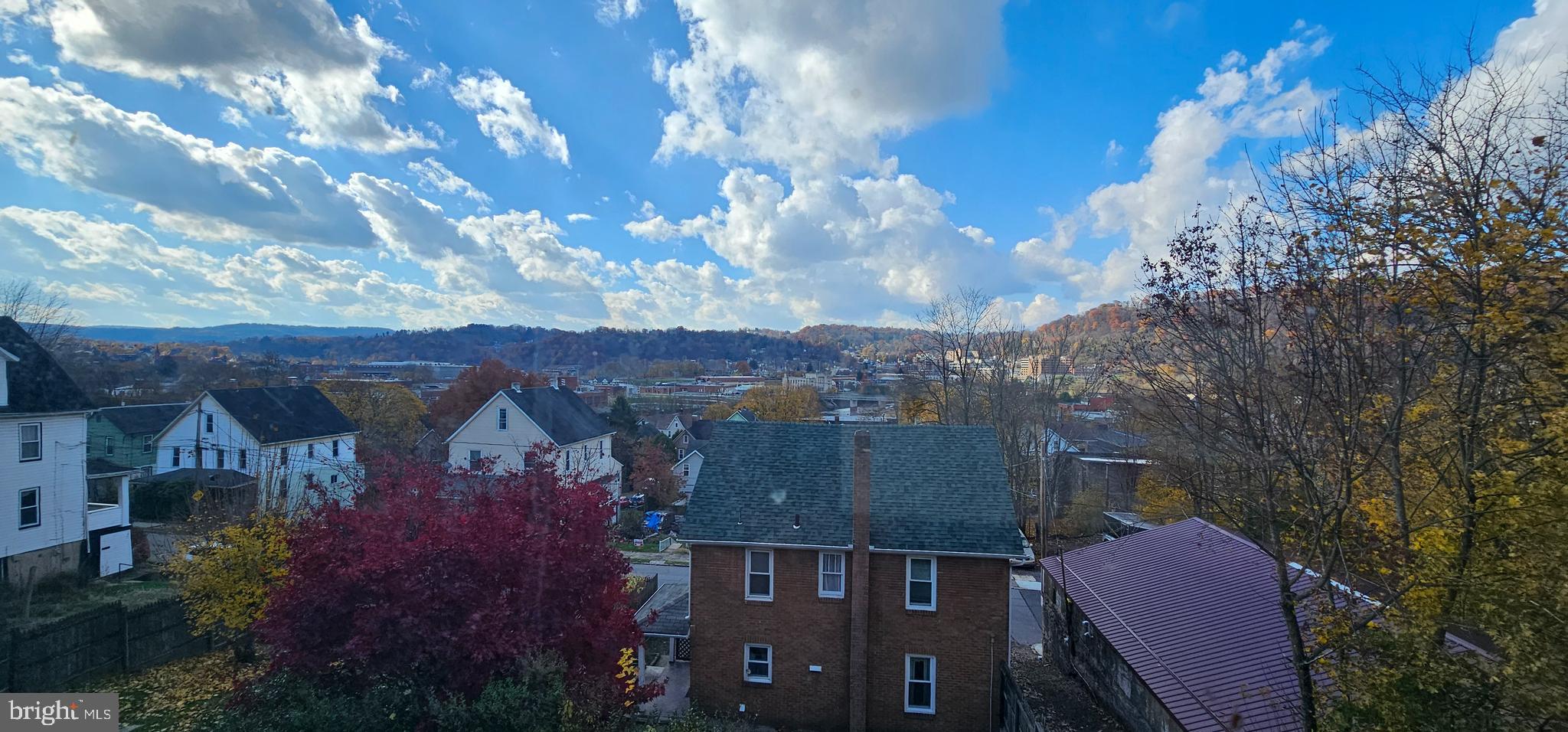 922-924 Von Lunen Road Johnstown, PA 15902 - Photo 4 of 54 a view of a house with a yard and sitting area