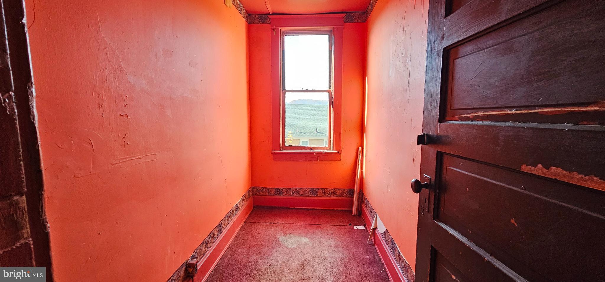 922-924 Von Lunen Road Johnstown, PA 15902 - Photo 8 of 54 a view of a room with wooden floor and a window