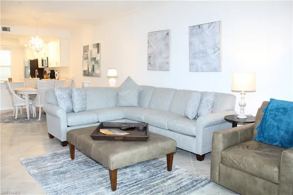 a living room with furniture and a couch