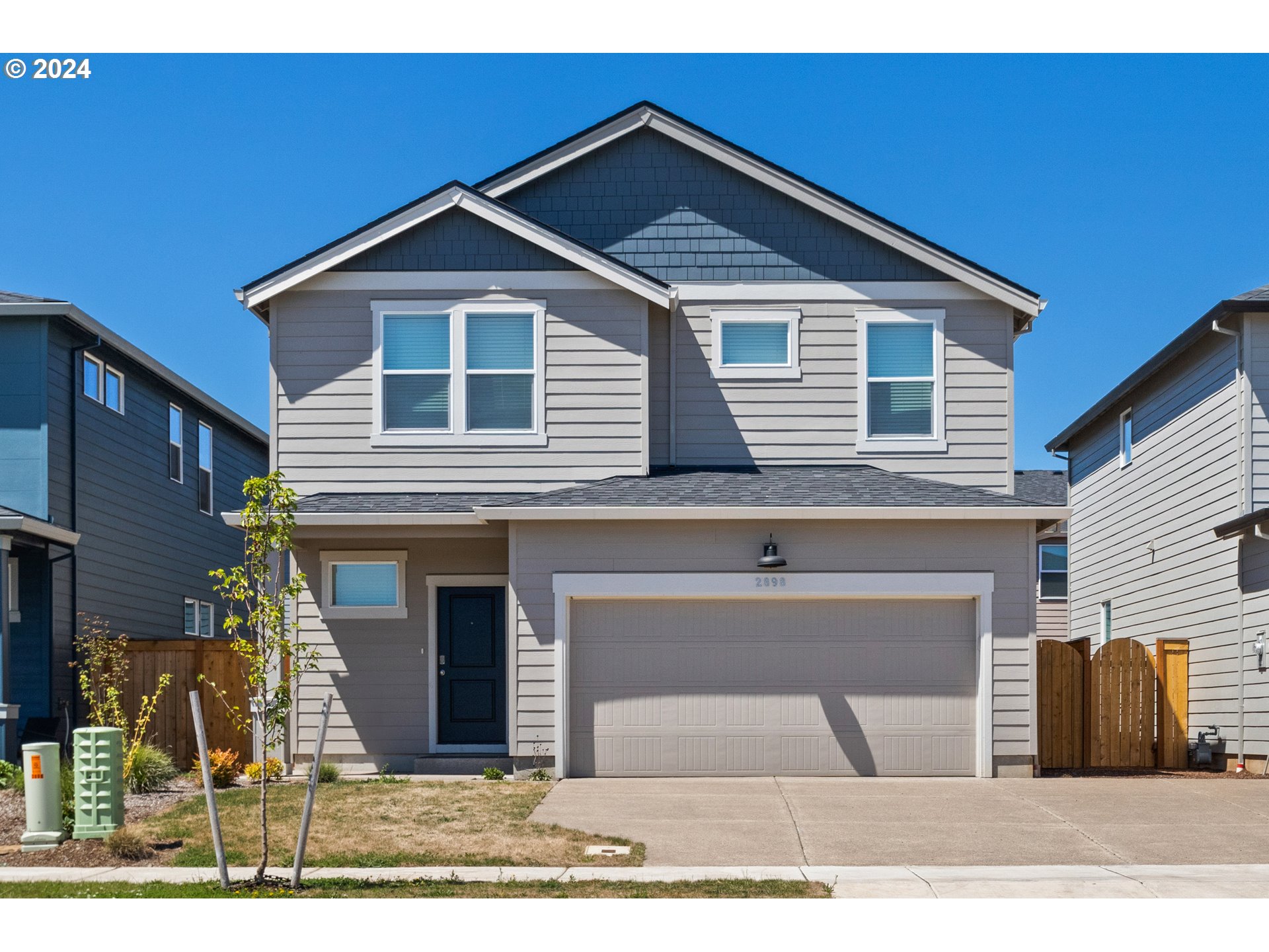 2898 V Street Springfield, OR 97477 - Photo 1 of 47 a front view of a house with a yard