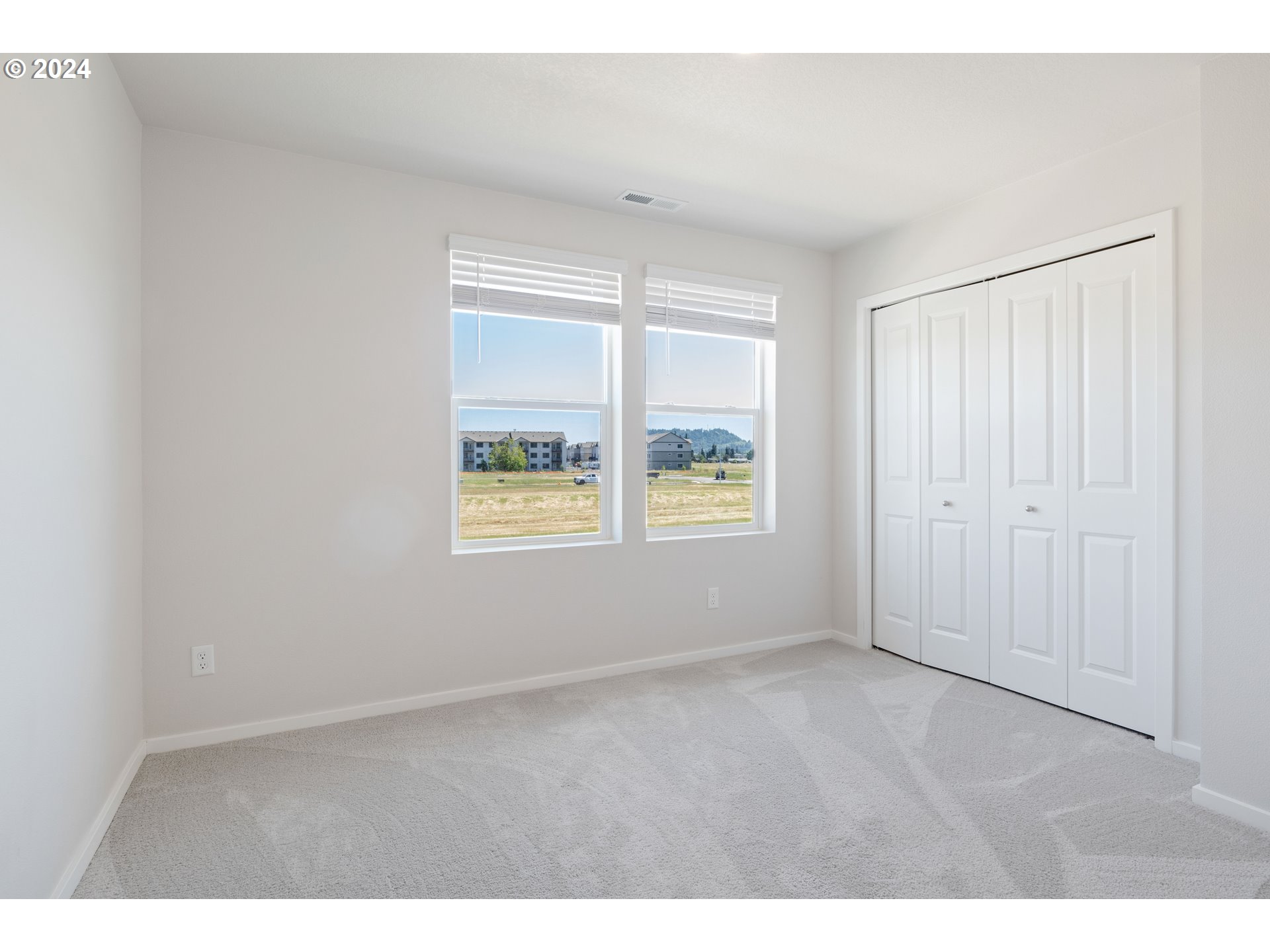 2898 V Street Springfield, OR 97477 - Photo 21 of 47 a view of an empty room with a window