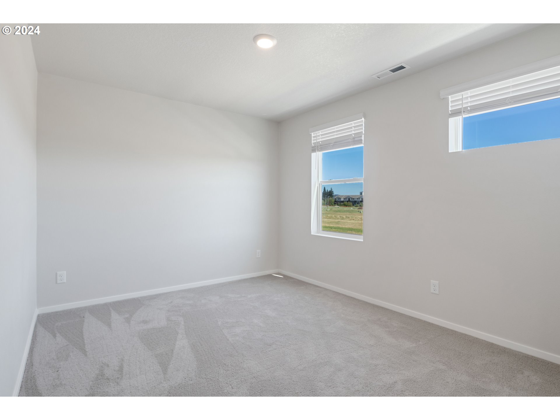 2898 V Street Springfield, OR 97477 - Photo 25 of 47 a view of an empty room with a window