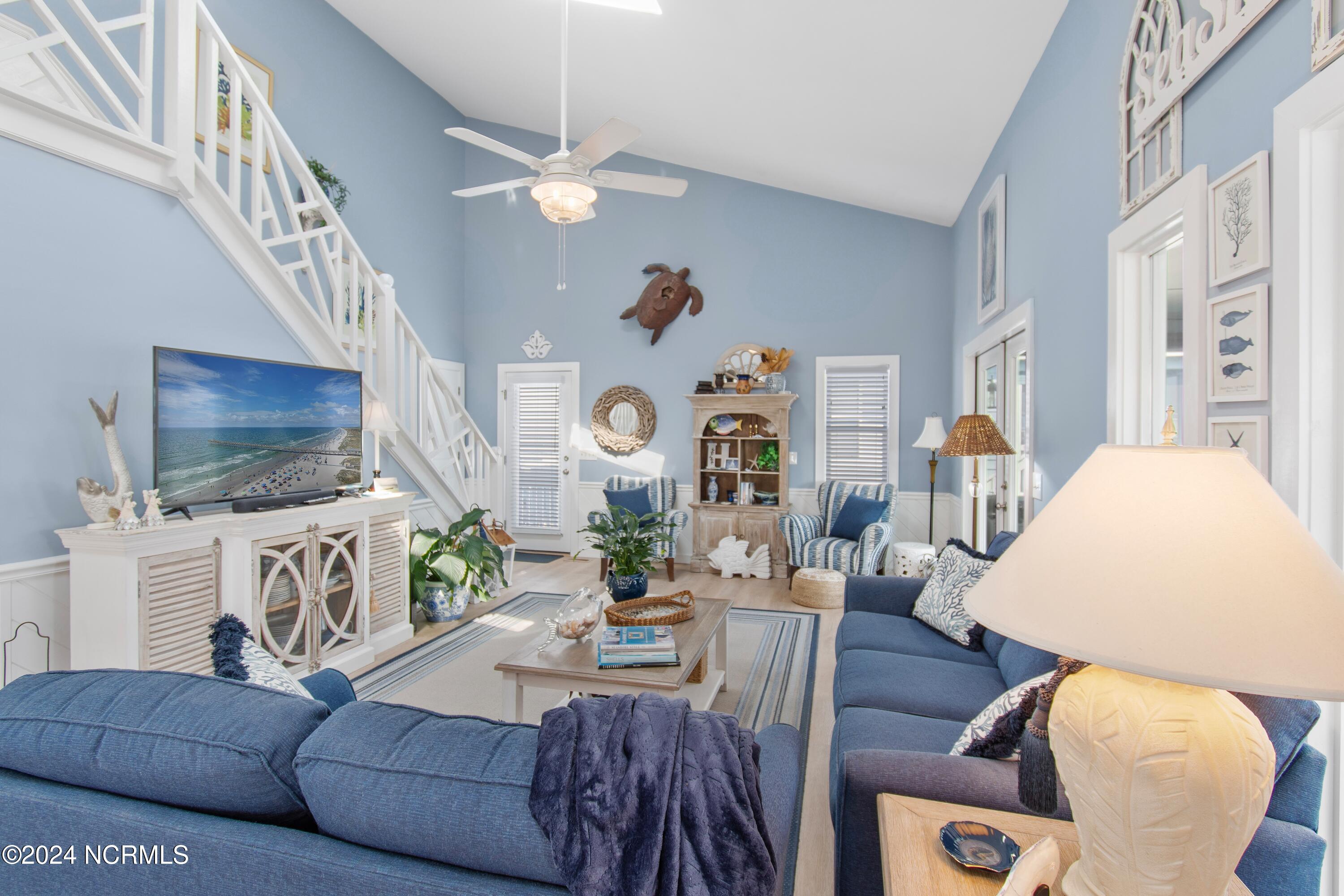 415 Sailfish Street Sunset Beach, NC 28468 - Photo 12 of 63 Notice the beautiful woodwork, large space and plenty of natural light.