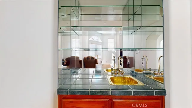 a bathroom with a sink and a shower