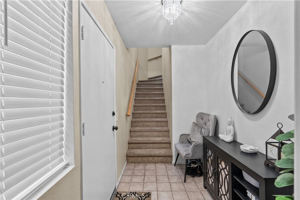 25258 Steinbeck Avenue, Unit F Stevenson Ranch, CA 91381 - Photo 11 of 20 Entrance from garage