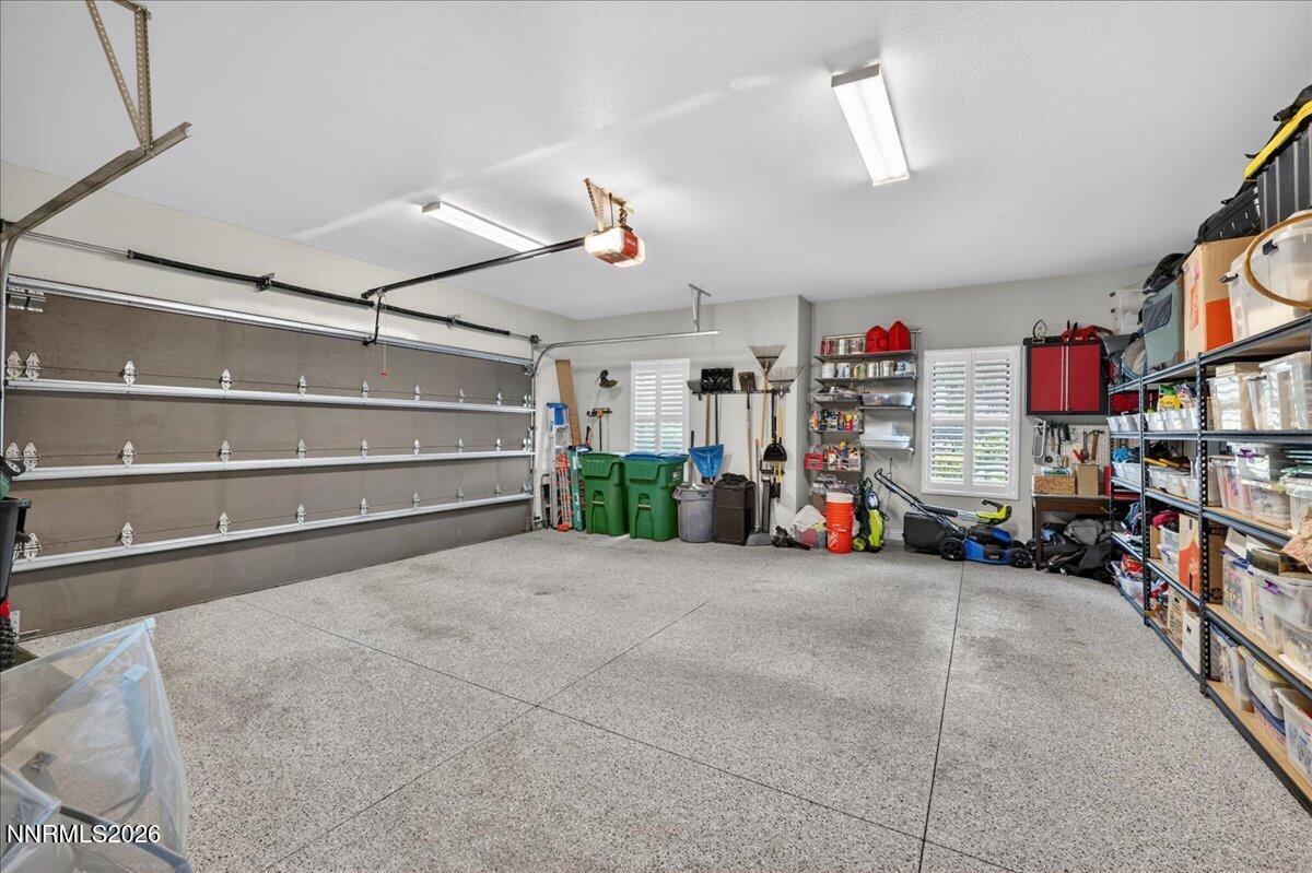 5096 Bordeaux Court Reno, NV 89511 - Photo 54 of 70 a view of a garage with rack and bicycle