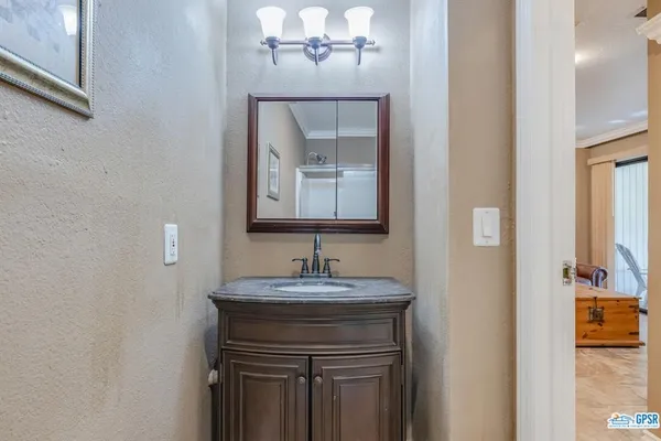 an aerial view of a house with garden space and street view