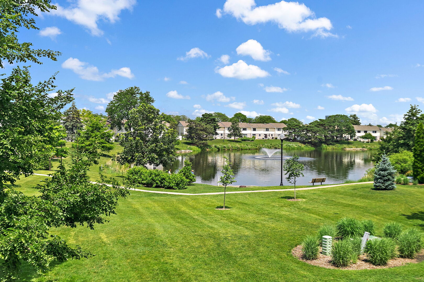 632 Bridgeview Point Schaumburg, IL 60194 - Photo 19 of 25 a view of a lake with a city