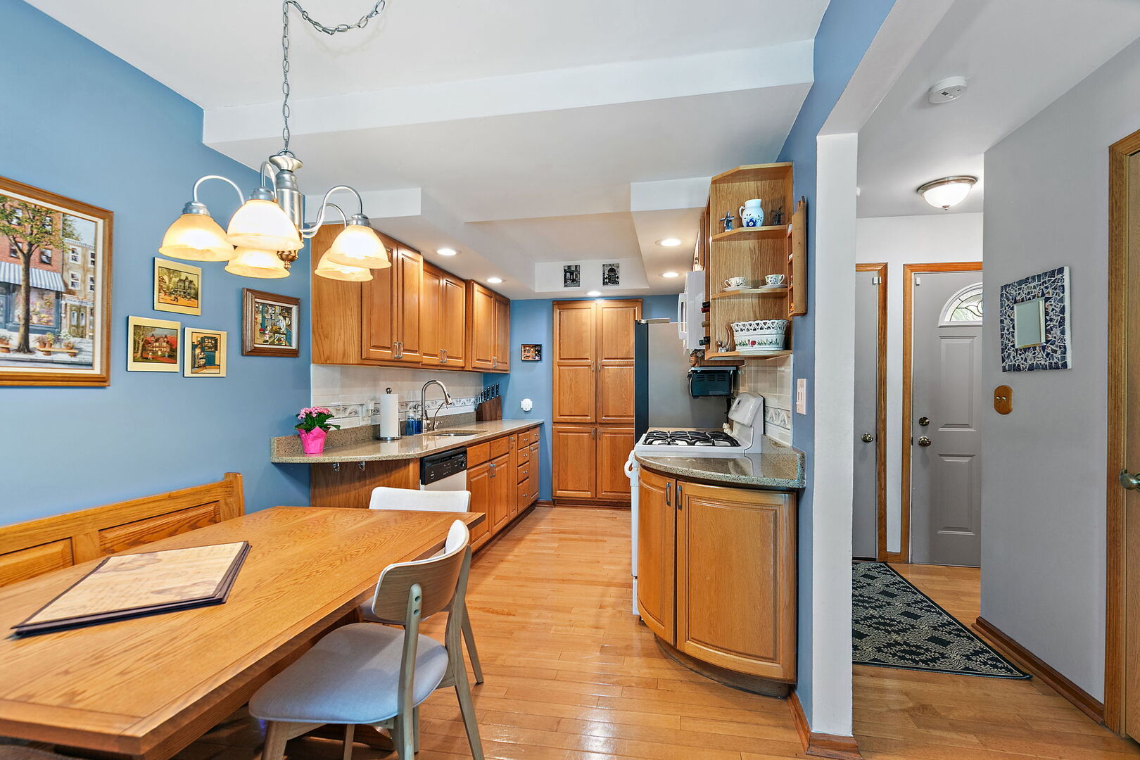 632 Bridgeview Point Schaumburg, IL 60194 - Photo 3 of 25 a kitchen with stainless steel appliances granite countertop a stove and refrigerator