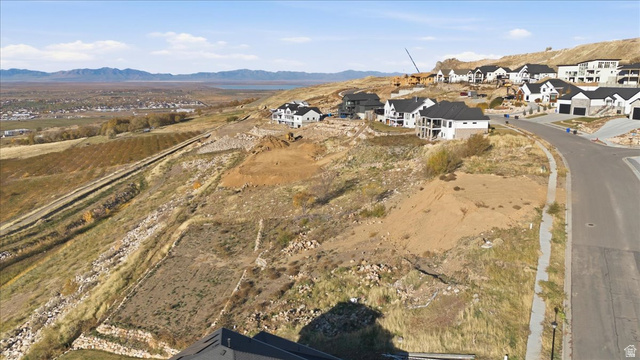 1211 West Fallow Way Ogden, UT 84414 - Photo 7 of 20 Aerial view of property's location featuring a mountain backdrop and nearby suburban area