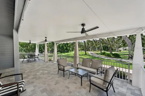 a kitchen with stainless steel appliances a refrigerator and a stove top oven