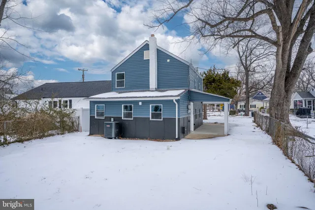 a view of house with yard and entertaining space