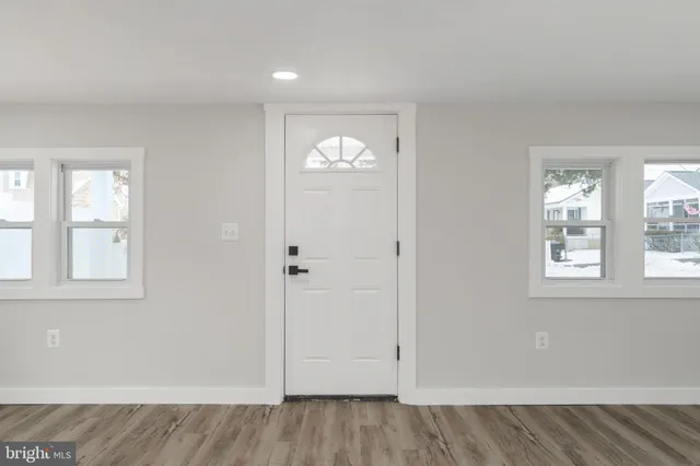 an empty room with windows