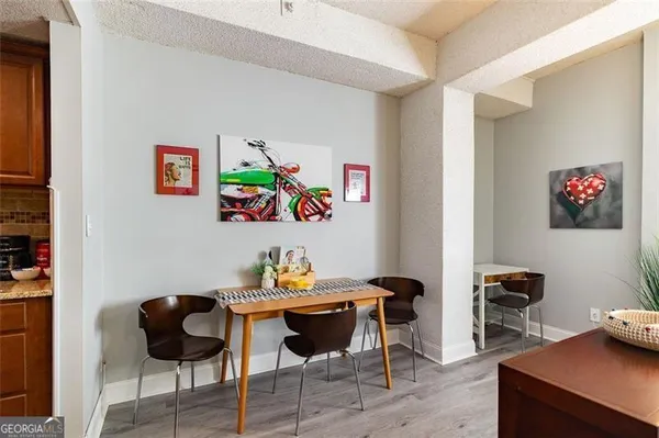 a view of a workspace with furniture