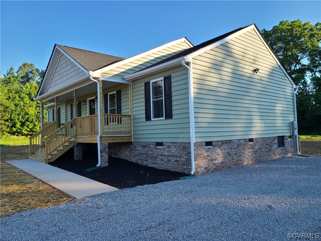 319 Hawkins Farm Road Bumpass, VA 23024 - Photo 2 of 11 front view of a house with a yard