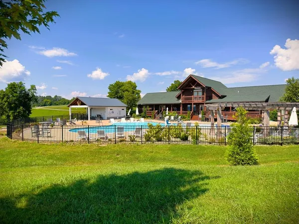 a view of a house with a big yard