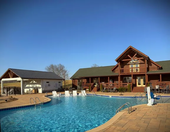 a view of a house with swimming pool yard and porch