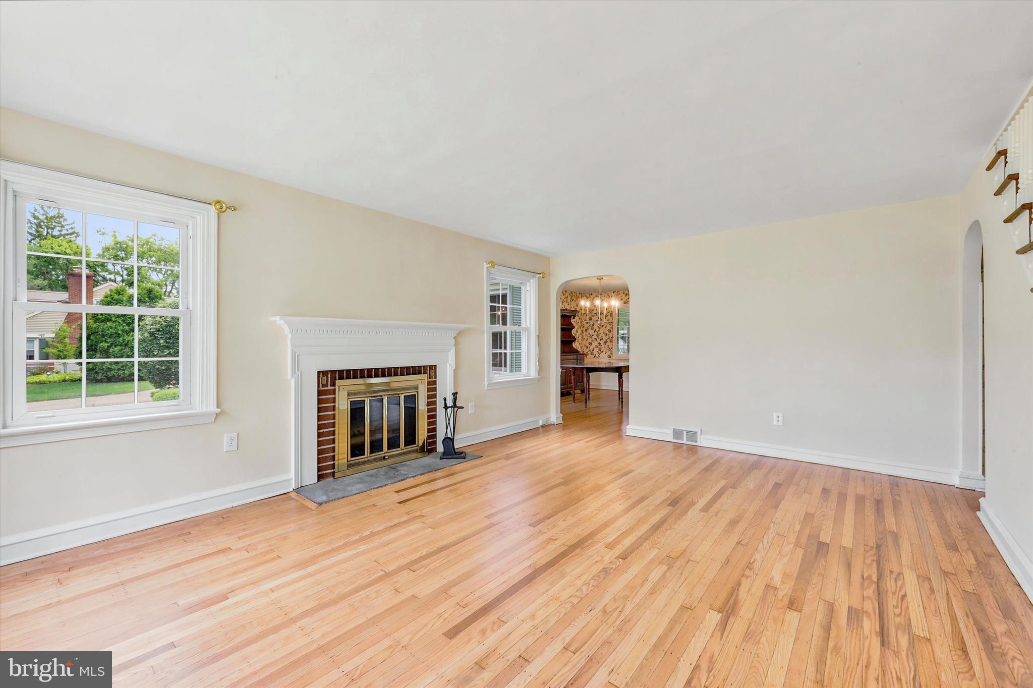 308 Henry Lane Wallingford, PA 19086 - Photo 4 of 36 Living room w/ wood burning fireplace