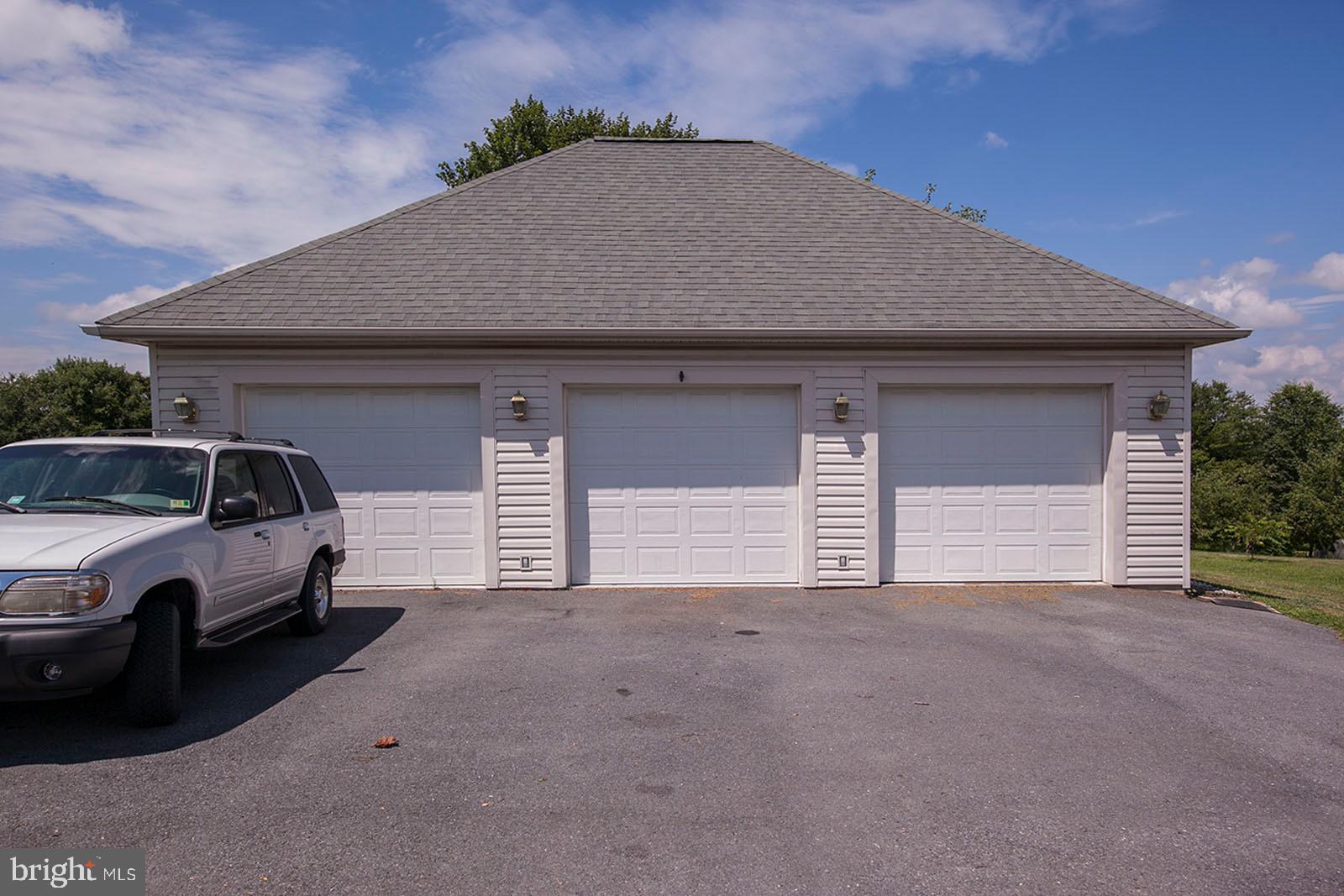 1379 Cedar Grove Road Winchester, VA 22603 - Photo 4 of 57 3 Car Garage with workshop area/main parking area