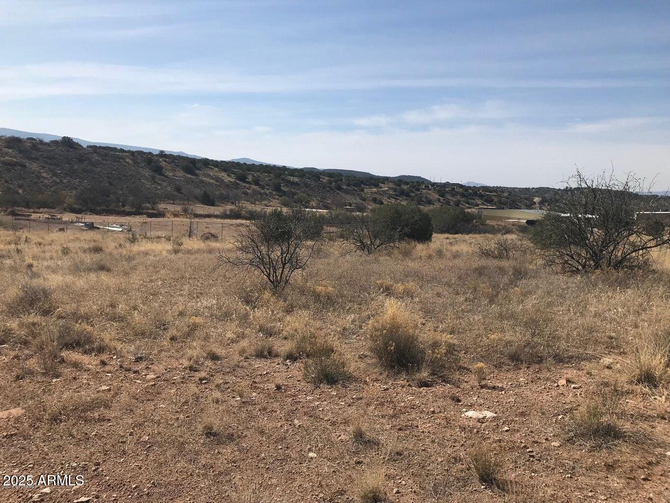 6775 North Falcon View Drive, Unit 160 Rimrock, AZ 86335 - Photo 5 of 6 a view of a dry field with mountains in the background
