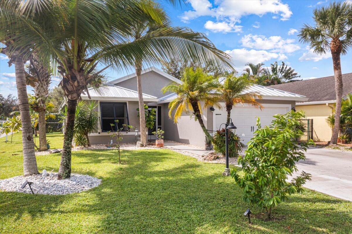 2484 Southwest Century Way Stuart, FL 34997 - Photo 1 of 56 Frontyard