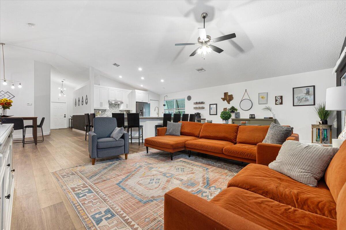 2484 Southwest Century Way Stuart, FL 34997 - Photo 15 of 56 Family room looking to kitchen