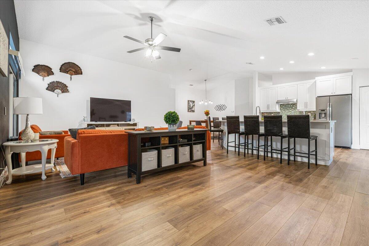 2484 Southwest Century Way Stuart, FL 34997 - Photo 16 of 56 Family room relax area shows space
