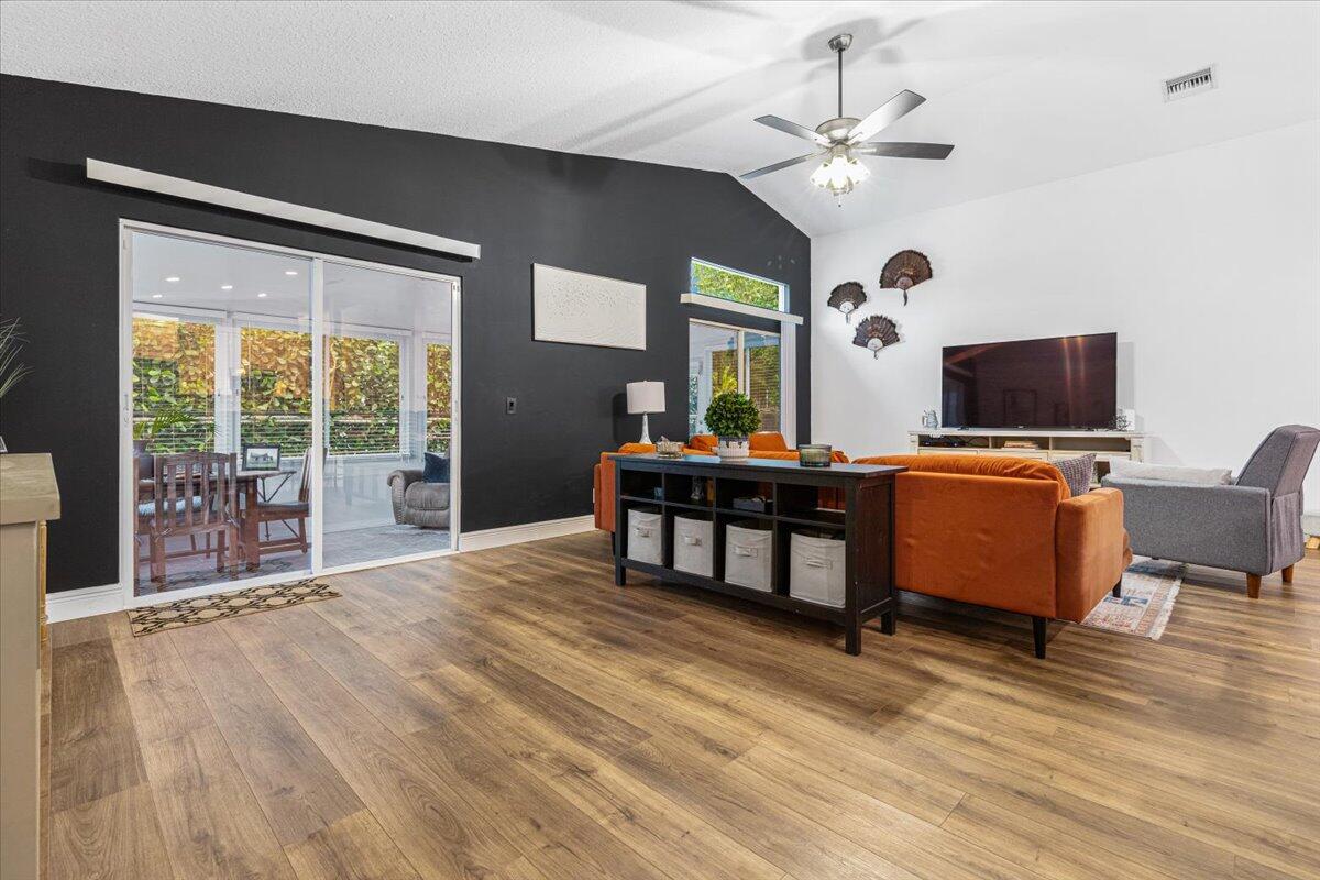2484 Southwest Century Way Stuart, FL 34997 - Photo 19 of 56 Family room shot looking out to All seas
