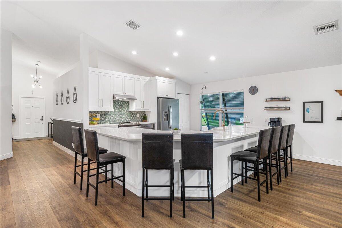 2484 Southwest Century Way Stuart, FL 34997 - Photo 8 of 56 Kitchen Island 9 seats
