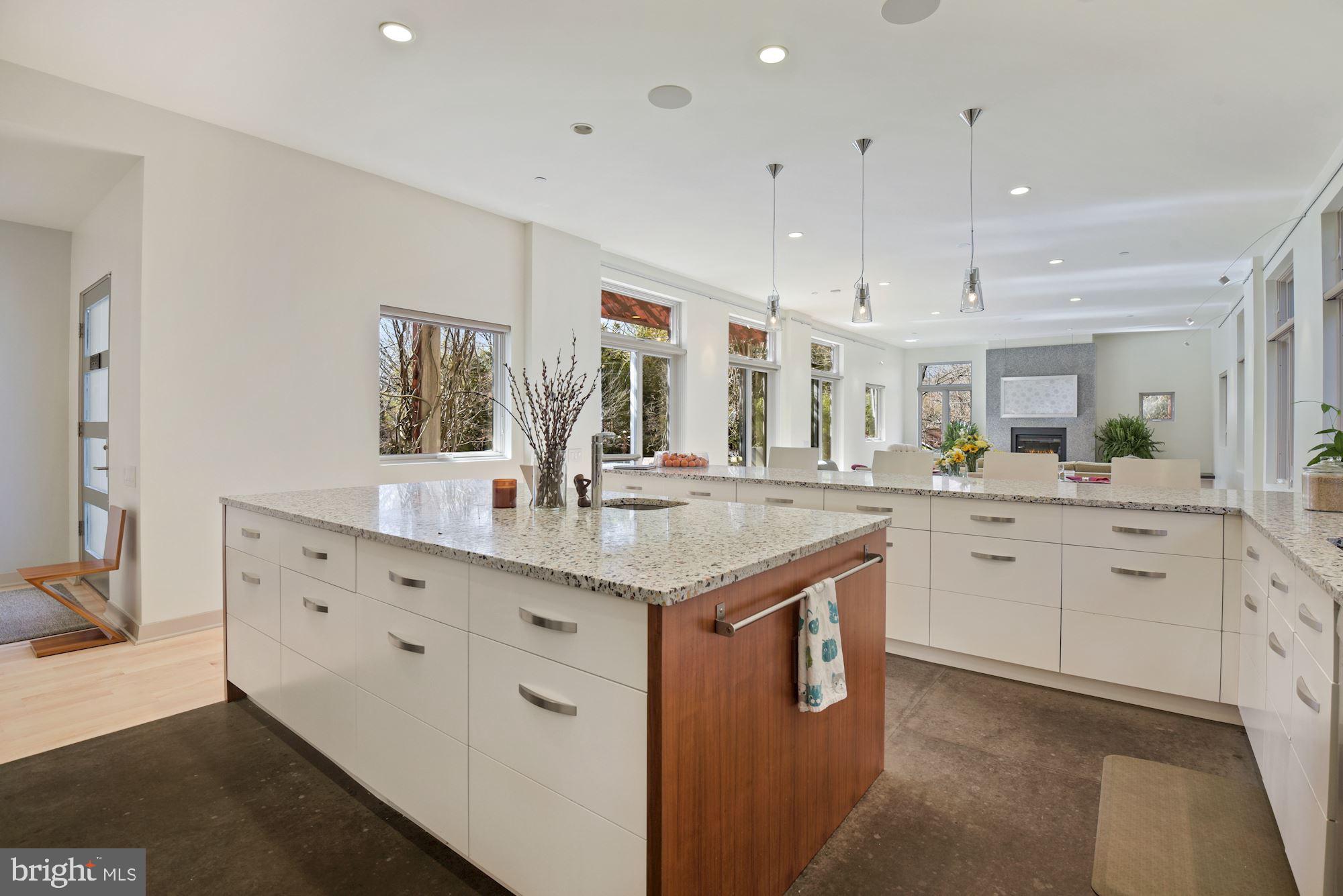 6301 West Halbert Road Bethesda, MD 20817 - Photo 13 of 55 Kitchen Island and Front Door