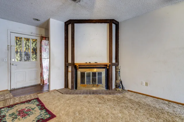 a stove top oven sitting inside of a kitchen