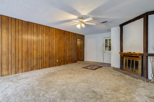 a kitchen with appliances and cabinets