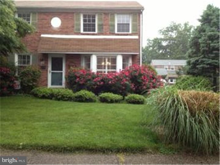 524 Paddock Road Havertown, PA 19083 - Photo 1 of 15 a front view of house and yard with green space