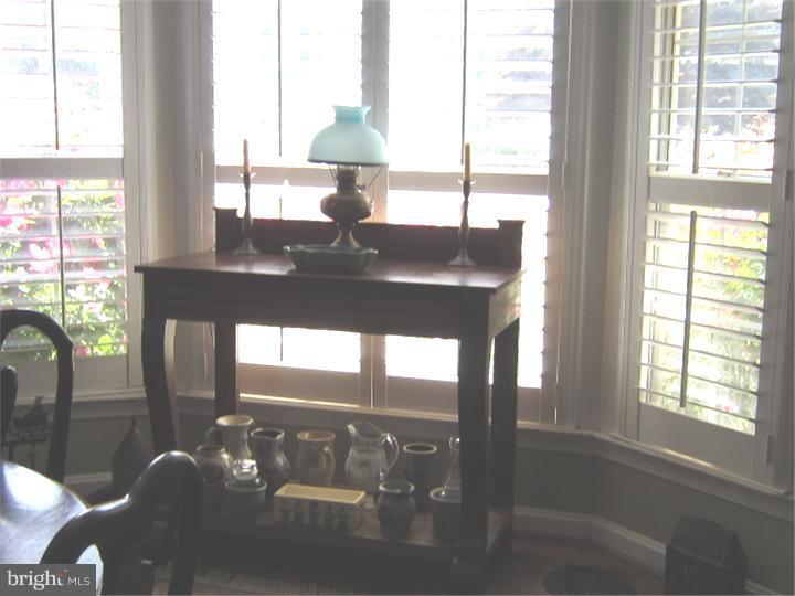 524 Paddock Road Havertown, PA 19083 - Photo 8 of 15 a view of a balcony dining table and chairs