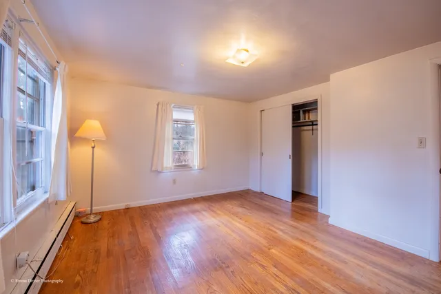 a view of an empty room with storage