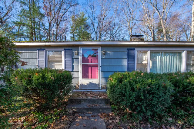 a backyard of a house with lots of green space