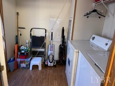 514 West Lake Road Spout Spring, VA 24593 - Photo 12 of 19 a view of a room with gym equipment