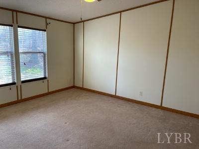 514 West Lake Road Spout Spring, VA 24593 - Photo 16 of 19 a view of an empty room with a window