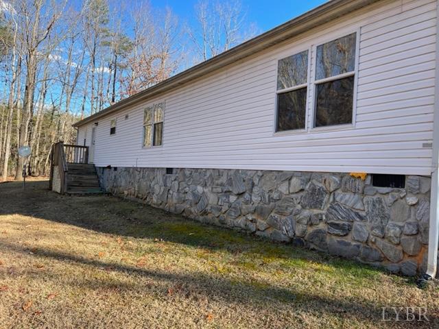 514 West Lake Road Spout Spring, VA 24593 - Photo 4 of 19 a view of a backyard of the house