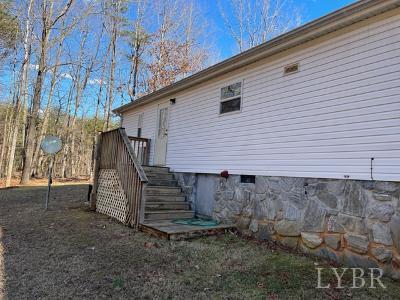 514 West Lake Road Spout Spring, VA 24593 - Photo 5 of 19 a view of a house with a yard
