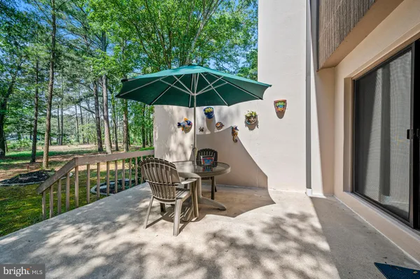 an outdoor view of garden with patio