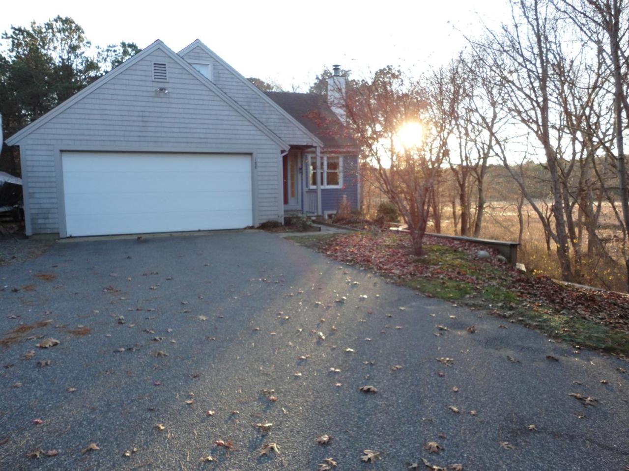 188 Abbey Gate Road Cotuit, MA 02635 - Photo 20 of 23 a view of a house with a outdoor space
