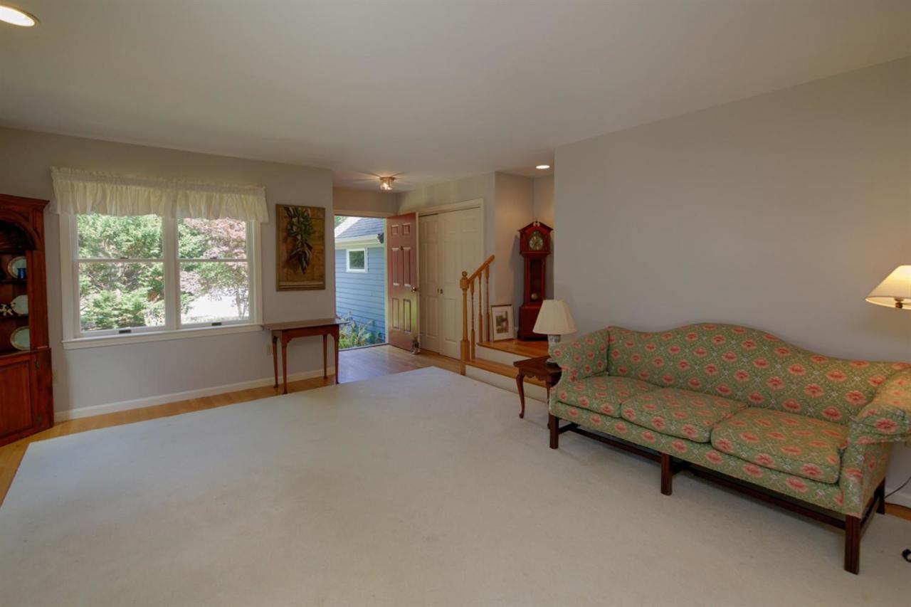 188 Abbey Gate Road Cotuit, MA 02635 - Photo 5 of 23 a living room with furniture and a large window