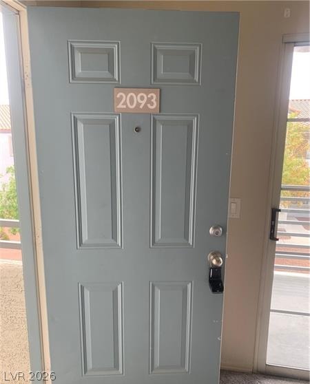 Secure entry via a panel door and smart lock, inviting you home.