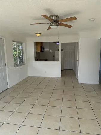 a view of a livingroom with a furniture