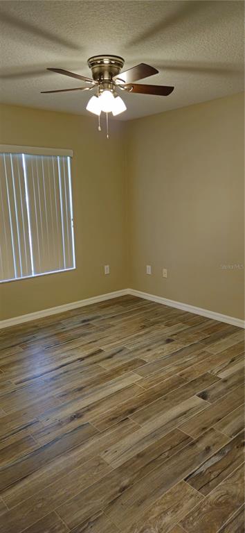 1568 Grove Court Tavares, FL 32778 - Photo 12 of 15 a view of room with window
