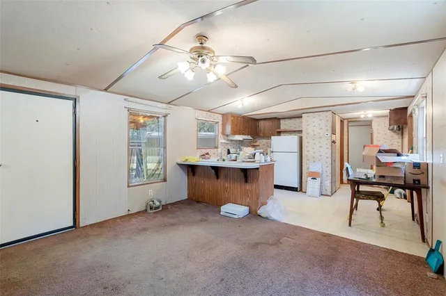 a bathroom with a shower and a toilet