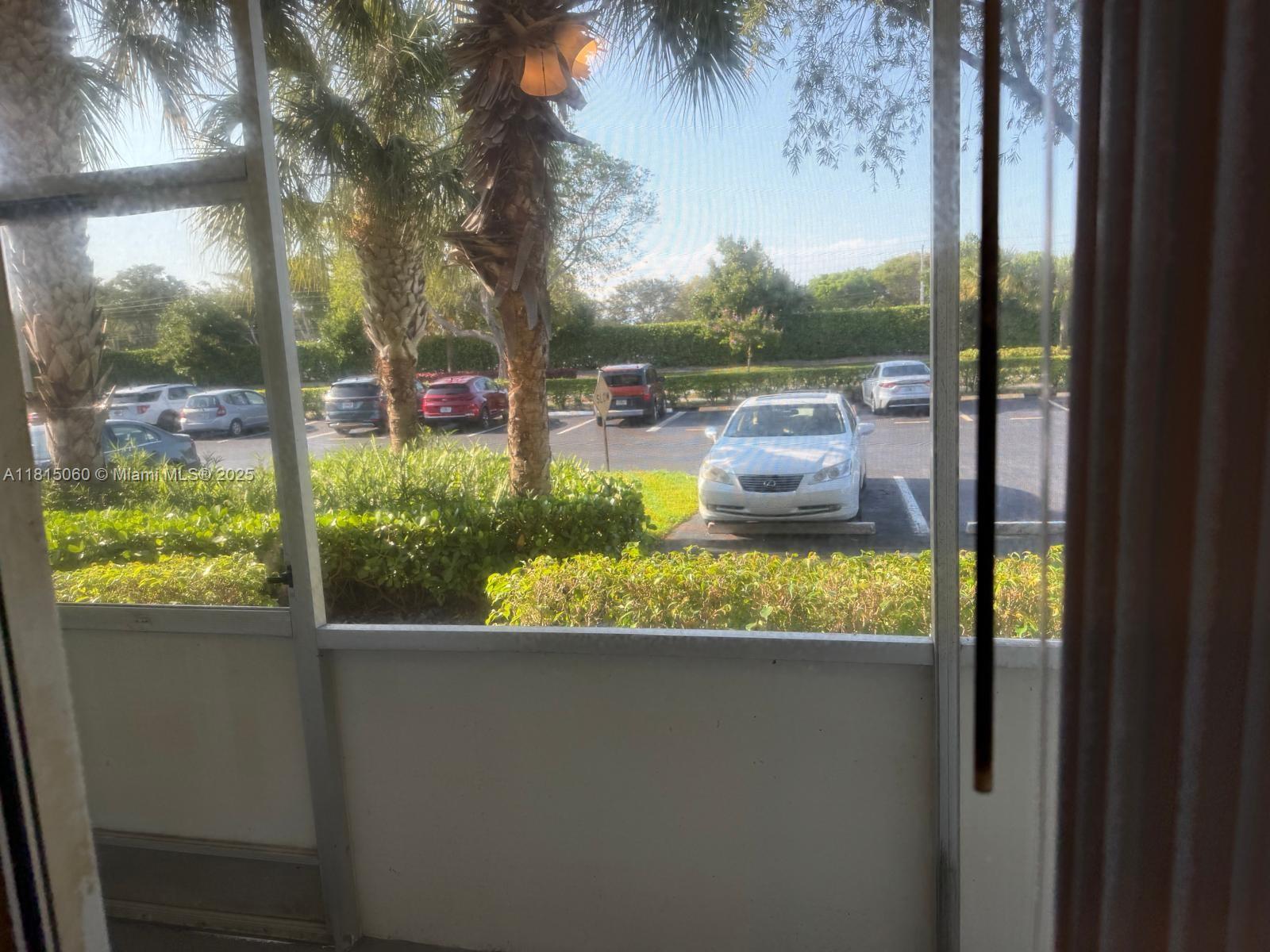 217 Suffolk F, Unit 217 Boca Raton, FL 33434 - Photo 8 of 11 a view of a balcony with lake view